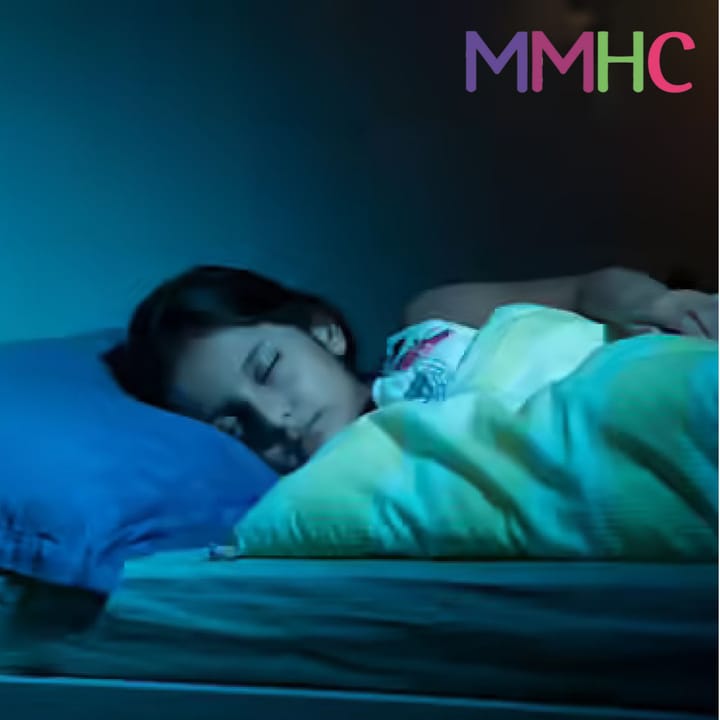 A 12-year-old girl sleeping peacefully on her mattress, highlighting concerns about hidden toxic chemicals in children's bedding in India.